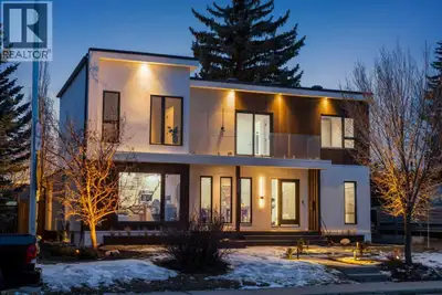 Located in Spruce Cliff directly across from Spruce Cliff Ridge, this custom-built Scandinavian-insp...