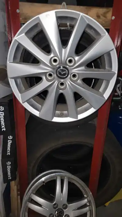 Wheels are in great shape ready for winter tires to be installed. Will fit most Mazda suvs and cars...