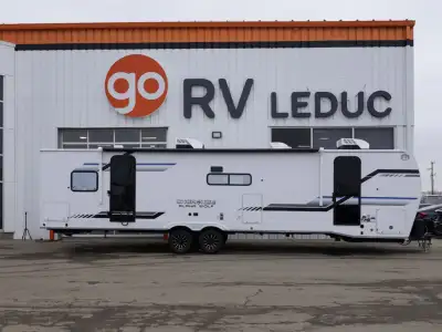 The 2026 Alpha Wolf 29DCB by Forest River is a spacious and well-equipped travel trailer designed fo...