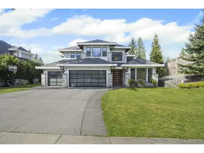 Custom-Built luxury home on a RARE 1/2-acre CORNER LOT in Fraser Heights! This 6,532 sq. ft. home fe...