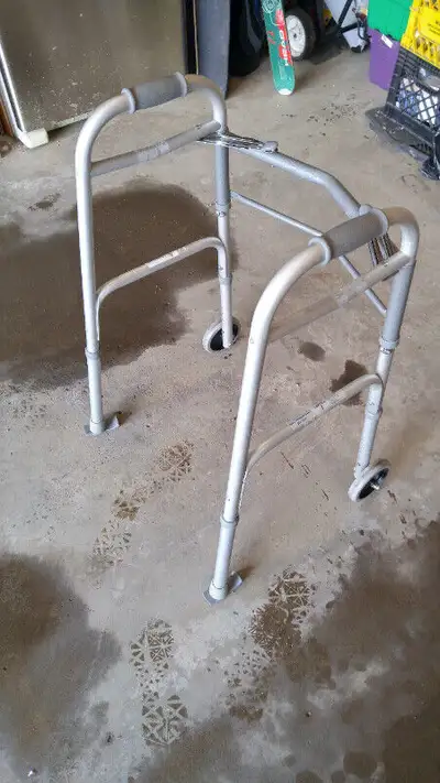Drive Medical Light Folding Walker with wheels (5 inch), in great condition .firm