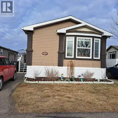 Welcome to 212 Engineer Avenue located in the Manufactured Housing Community of STATION GROUNDS in C...
