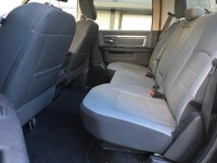 The 2022 Ram 1500 Classic SLT 4x4 Crew Cab in striking black is the perfect combination of power and... (image 9)