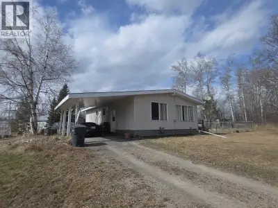 This four-bedroom, one-and-a-half-bathroom home is in beautiful Fraser Lake on two town lots adding...