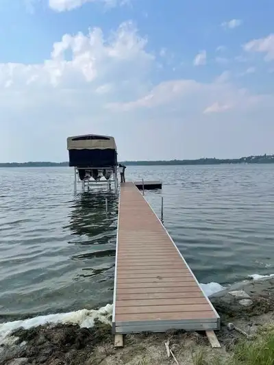 Features: 16’ pivoting ramp + 64’ of floating dock + 8x8 pad off to the side for seating SureStep Fl...