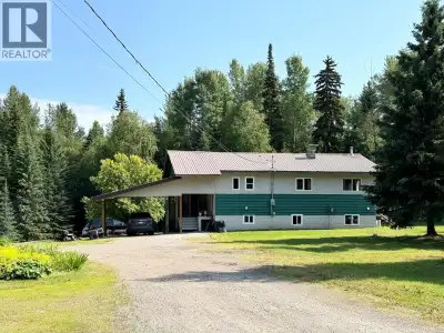 If country living is calling, this spacious 6 bedroom home in a parklike setting is hobby farm ready...