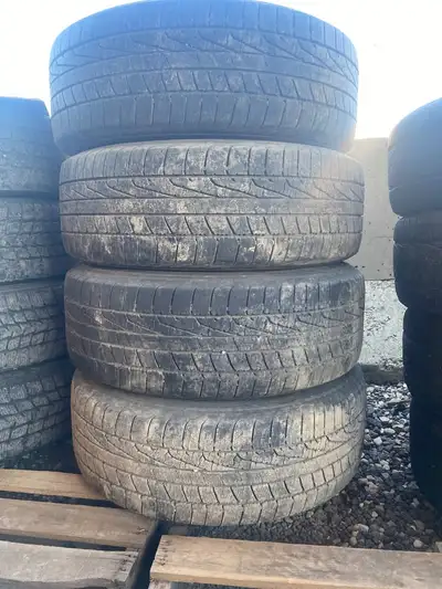 Set of 245/60R18 Goodyear Assurance all-season tires mounted on 18 steel wheels. Removed from a 2011...