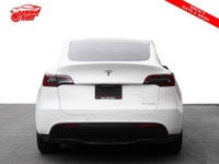Check out this sleek 2021 Tesla Model Y! With its Long Range trim, AWD capability, and luxurious fea... (image 4)