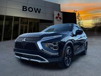 The 2024 Mitsubishi Eclipse Cross in a striking black finish is designed to tackle any road with its... (image 2)