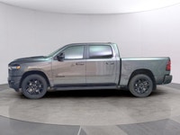 The 2025 Ram 1500 Sport 4x4 Crew Cab in an attractive gray is an impressive blend of power and luxur... (image 1)