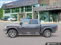 Dominate the road and conquer any challenge with this commanding 2017 Ram 1500 Laramie, finished in... (image 1)