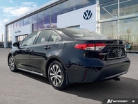 Experience unparalleled peace of mind and remarkable efficiency with the 2021 Toyota Corolla Hybrid,... (image 2)