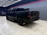 The 2019 Ram 1500 Sport 4x4 Quad Cab in a majestic black on black configuration exemplifies power, s... (image 4)