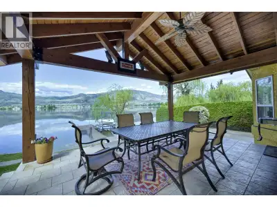 WATERFRONT LIVING AT ITS BEST! This immaculate, custom-built rancher is perfectly situated on a priv...
