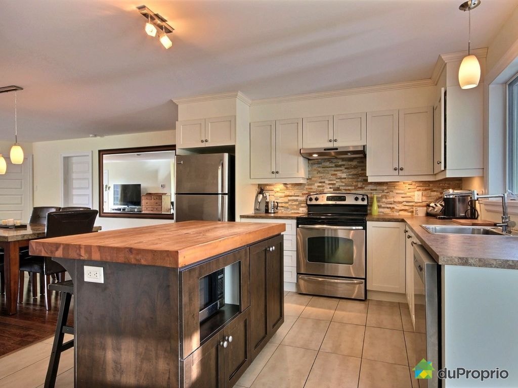 71e rue Est — photo 3