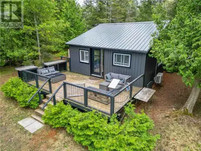 If you’re looking for a waterfront cottage with modern amenities, look no further than 798 The Mills...