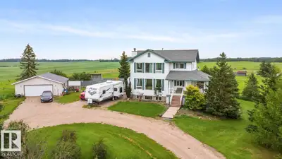 Welcome to this custom two-storey home set on 40 acres, just steps from Countryside Golf Club and mi...