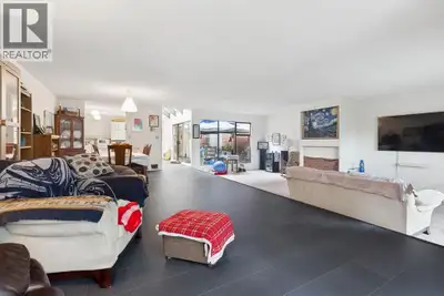 LANGARA ESTATES - Gated luxury living in a serene park-like setting. This beautifully maintained 3-b...