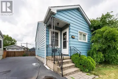 A little TLC goes a long way! With a fresh coat of paint and a few personal touches, this bungalow w...