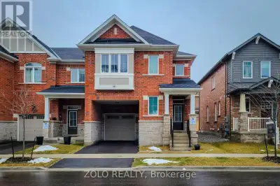 Beautiful and spacious 4 bedrooms + an office / 2.5 bathrooms / end unit 2 story townhouse with lots...