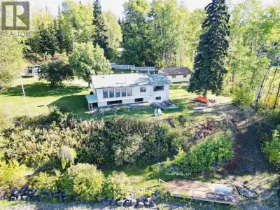 Lakefront home on just under one acre with stunning views and a private setting, only minutes from t...