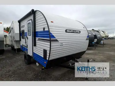 Sunset Park RV Sun Lite toy hauler travel trailer 14THX highlights: Two Burner Cooktop Rear Bed Wet...