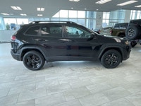 The 2021 Jeep Cherokee Altitude is a stylish and capable SUV that blends everyday comfort with Jeep'... (image 4)