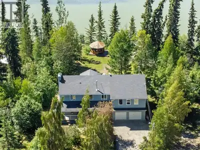 Lake life without leaving real life behind. Just 30 minutes from Whitehorse, this .86-acre South M'C...
