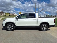 NEW TO CANADA? WE HAVE AN APPROVAL WAITING FOR YOU! The 2017 Honda Ridgeline EX-L is a versatile pic... (image 3)