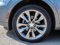 Experience the elegance and sophistication of the 2021 Buick Envision Avenir in a stunning gray exte... (image 5)