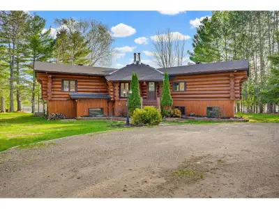 Nestled on a quiet cul-de-sac along the Ottawa River, this stunning 4-bedroom, 2-bathroom log house...