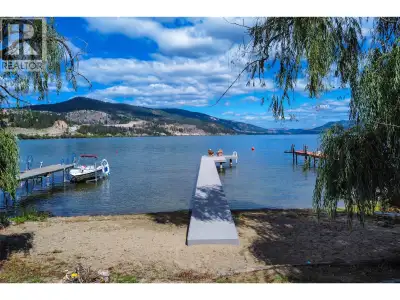 Just Imagine !! Owning 60 feet of Waterfront on Wood Lake * New Steel & Composite Deck *Development...