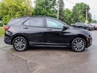 Experience the dynamic drive of the 2022 Chevrolet Equinox AWD RS in a striking black shade with adv... (image 2)