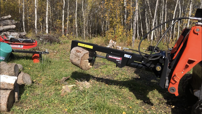 Split wood from the comfort of your cab on your skid steer. Canadian built. Split huge wood that is...