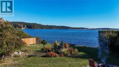 Welcome to your oceanfront retreat overlooking the serene Esquimalt Lagoon! This beautifully designe...