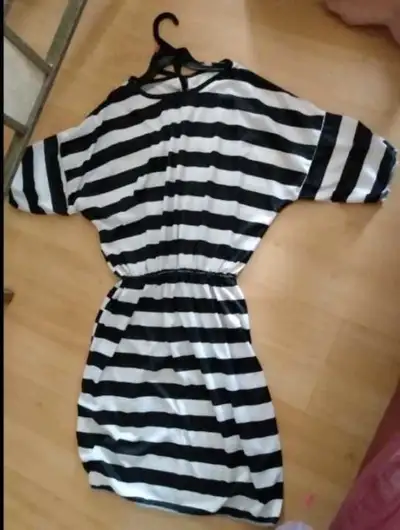 Jailbird dress costume with elastic waistband. ADULT OR CHILDREN Size medium Elf $5 (SOLD) Leg banda...