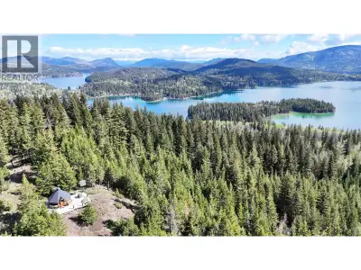Spectacular views and absolute privacy await on this unique 54.99-acre property in the Deka Lake are...