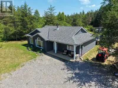 Gorgeous and only a few years old, this exceptional slab-on-grade country home offers the perfect bl...