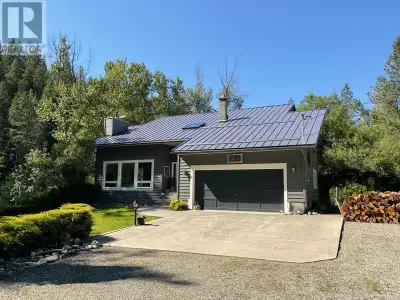 Private Oasis! This 3 bedroom, 4 bathroom house is a destination in itself! One would have to pay hu...