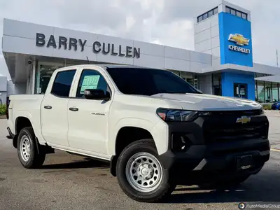 The 2026 Chevrolet Colorado 44 Work Truck in a crisp white finish is a powerful companion designed f...