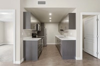 Amenities: In-suite Laundry • Security Cameras • Single or Double Car Garages Suite & Building: Two-... (image 3)