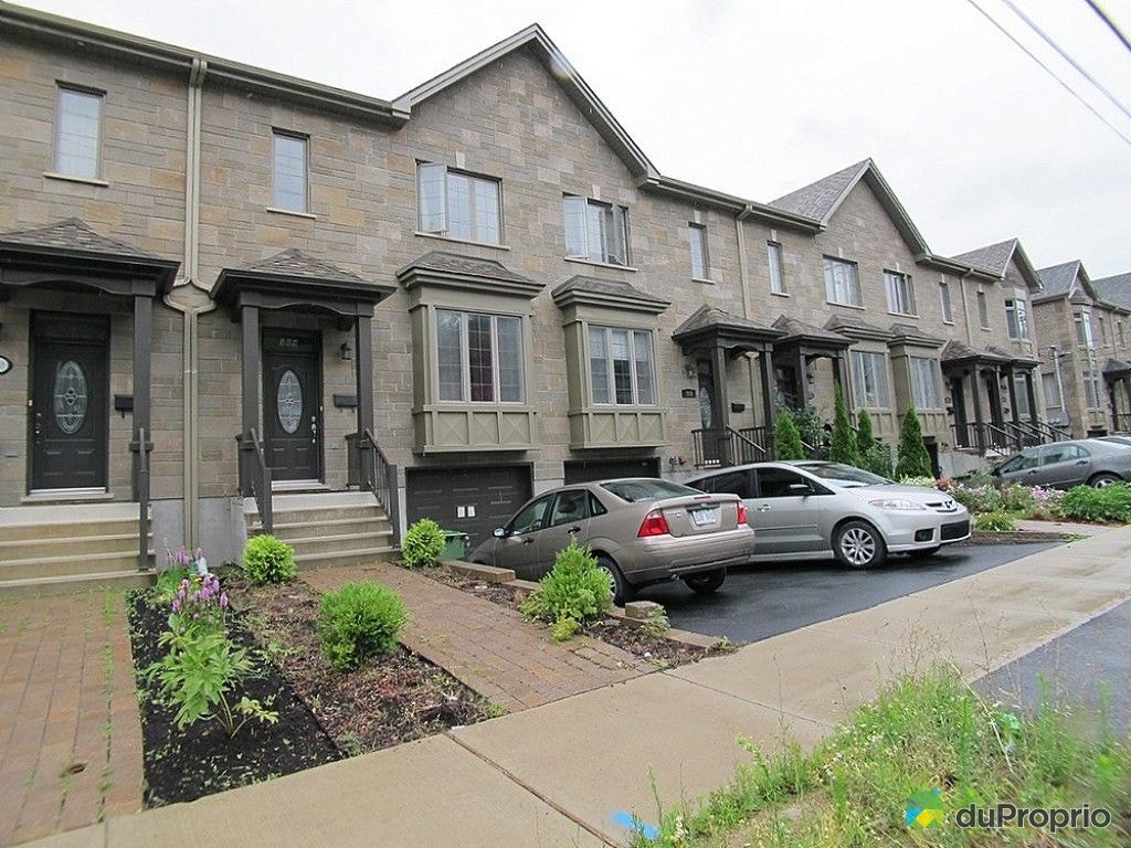 $699,000 - Townhouse for sale in Lachine — photo 1