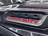 The 2019 Ram 2500 Laramie, with its bold black exterior and sophisticated 4x4 drive, promises except... (image 6)