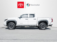 Introducing the 2024 Toyota Tacoma 4x4 Double Cab Auto SB, a white powerhouse designed for those who... (image 2)