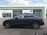 * 21-inch sport alloy wheels, dark-tinted radiator grille, unique front/rear bumpers, and large exha... (image 1)