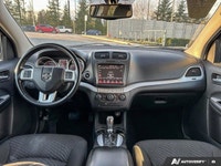 Designed for versatility and urban exploration, this 2017 Dodge Journey SXT Sport Utility in stunnin... (image 9)