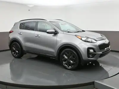 One owner just traded and fully KIA Certified this Sportage EX S features a complete power convenien...