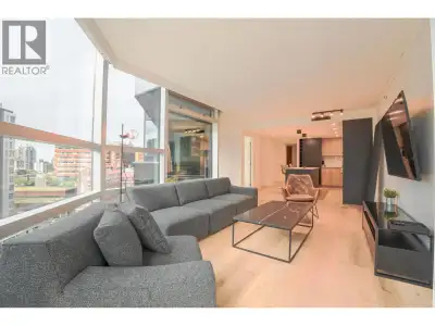 Immerse yourself in the vibrant lifestyle of Vancouver with this exquisitely furnished two-bedroom c...