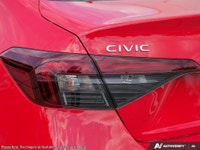 Introducing the stunning 2026 Honda Civic in an eye-catching red, designed to impress with its styli... (image 9)