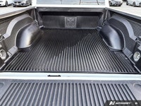 This commanding 2023 Ram 1500 Classic SLT Crew Cab Pickup, shimmering in Bright White with a functio... (image 8)